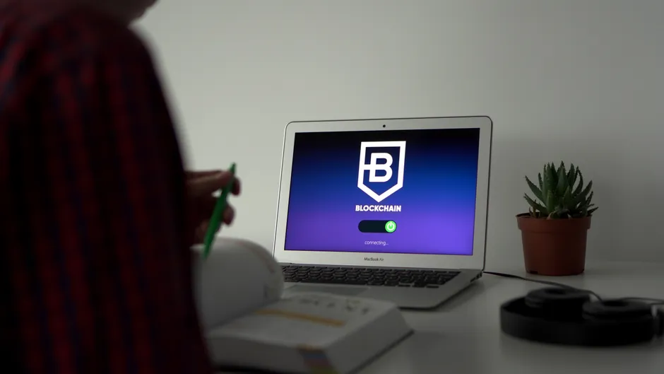 Image of a laptop displaying blockchain technology