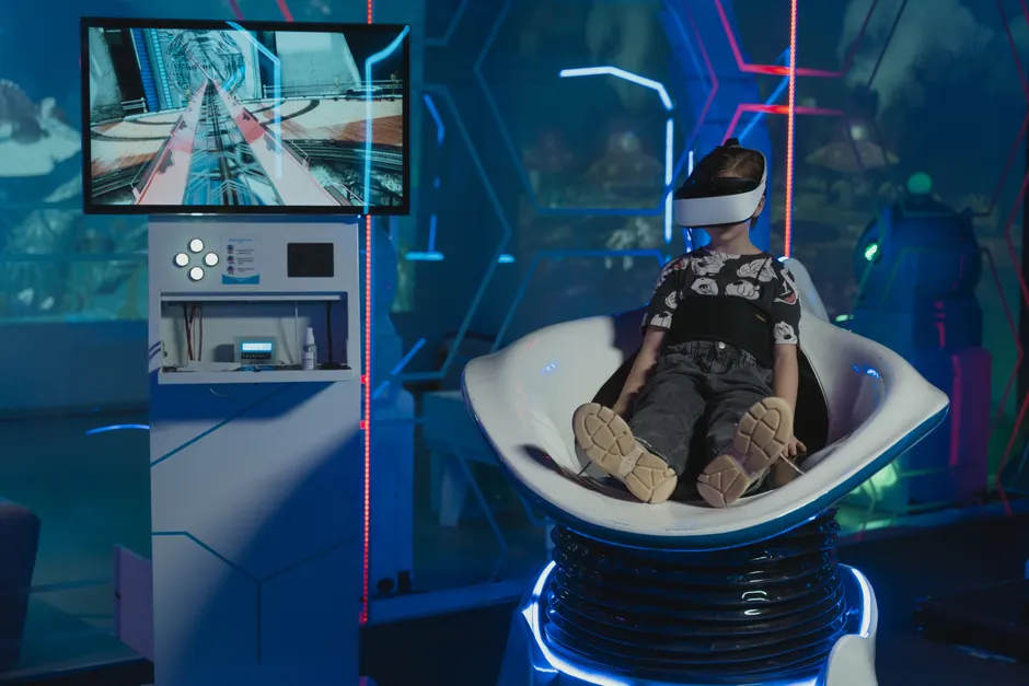 A child immersed in a futuristic virtual reality g